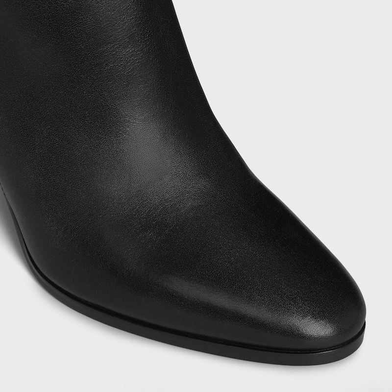 bottes hautes à brides triomphe en cuir de veau celine garance