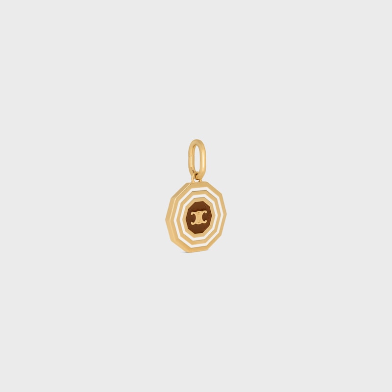médaille du triomphe decagon de céline charms en émail et laiton finition dorée