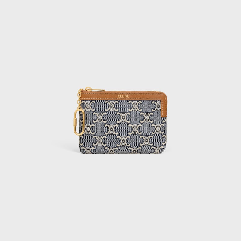 porte-monnaie entièrement recouvert dun motif jacquard triomphe.