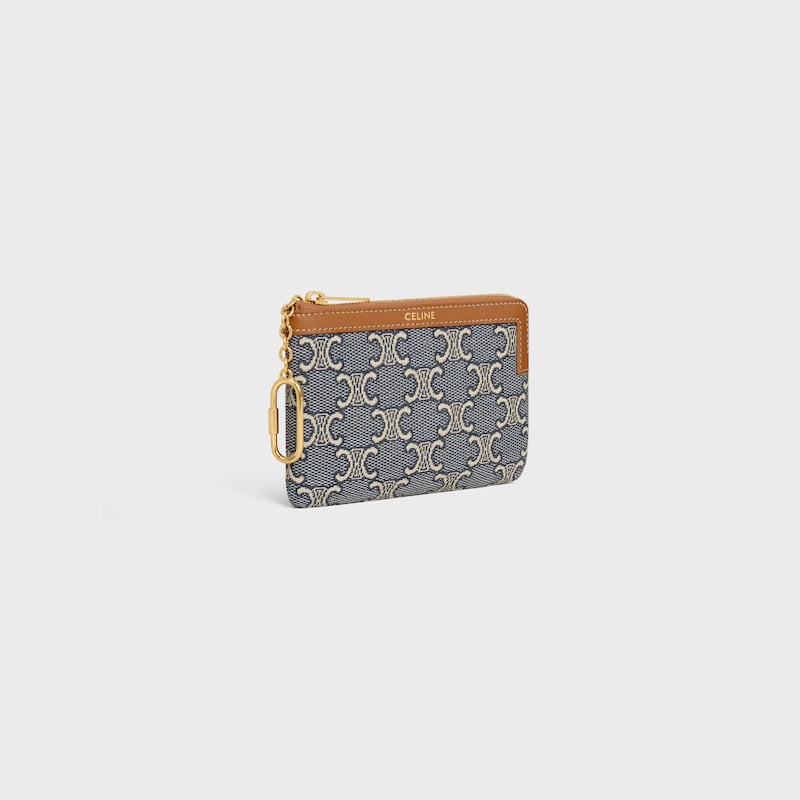 porte-monnaie entièrement recouvert dun motif jacquard triomphe.