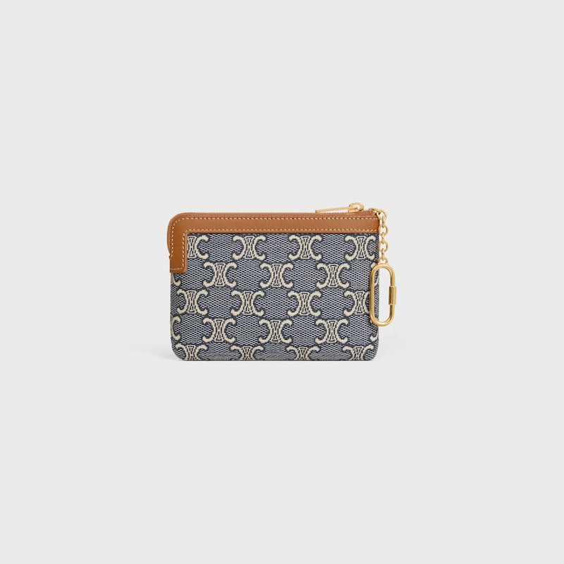 porte-monnaie entièrement recouvert dun motif jacquard triomphe.