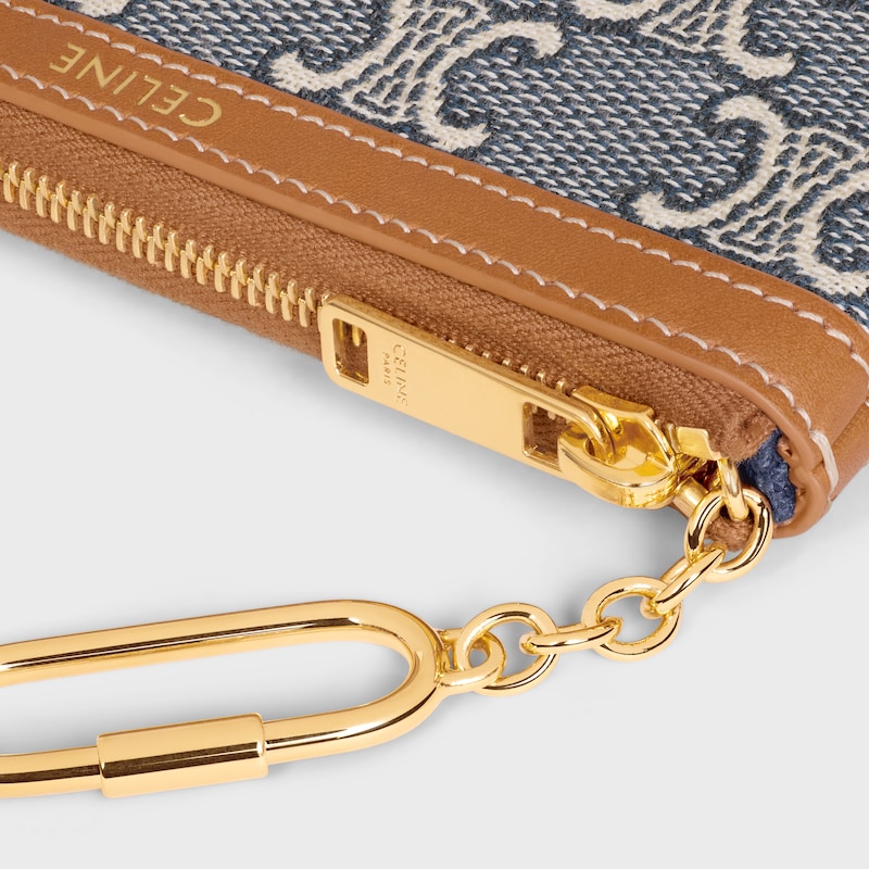 porte-monnaie entièrement recouvert dun motif jacquard triomphe.