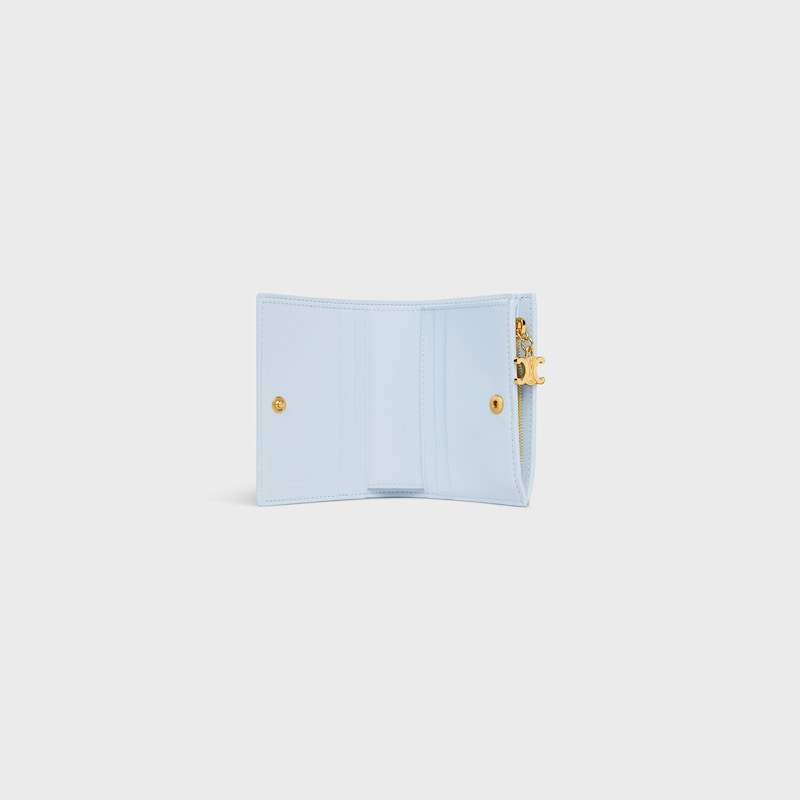 portefeuille compact triomphe charms en cuir de veau grainÉ