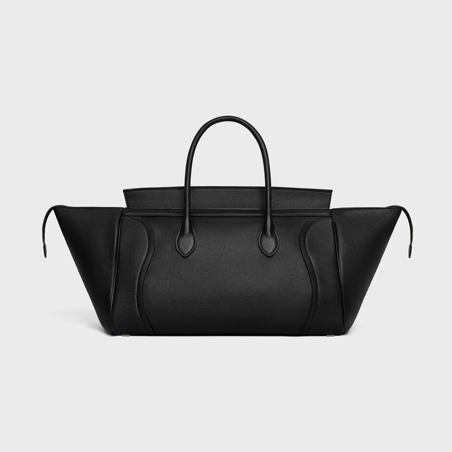 bagage neuf de taille moyenne en cuir dagneau souple et brillant