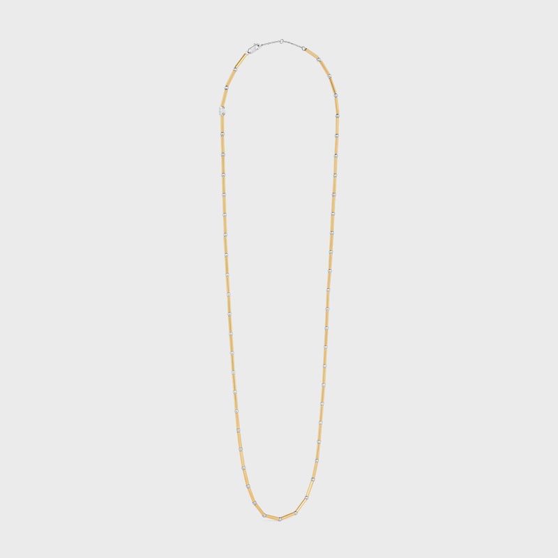 collier long celine charms en laiton avec finition or et rhodium