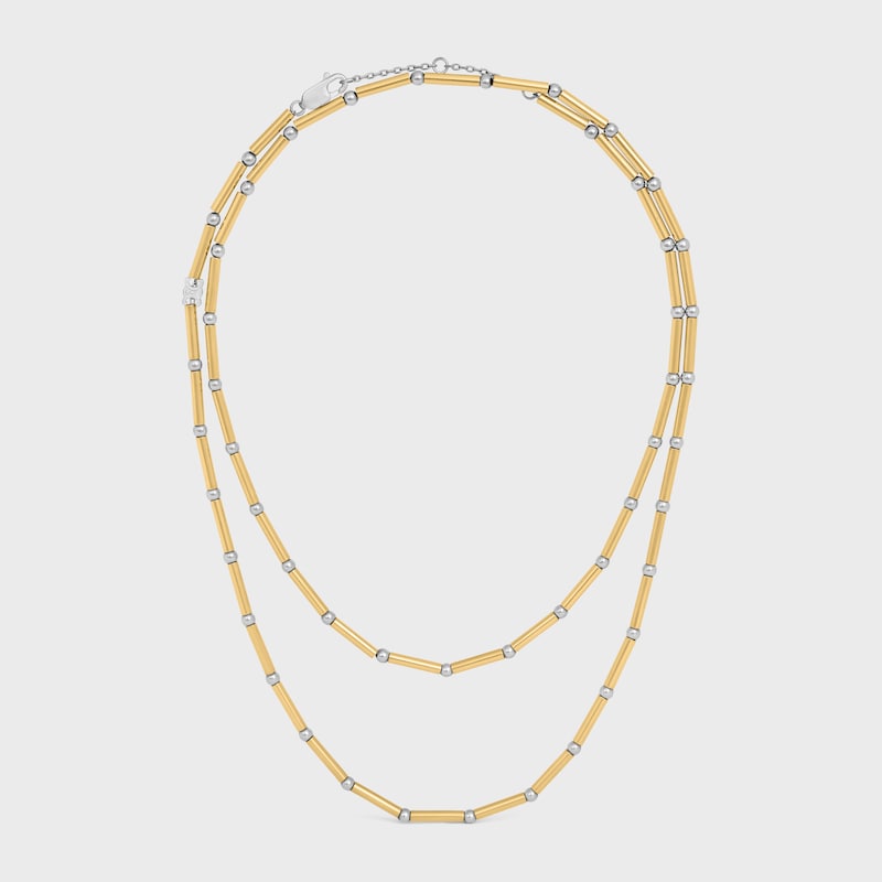 collier long celine charms en laiton avec finition or et rhodium