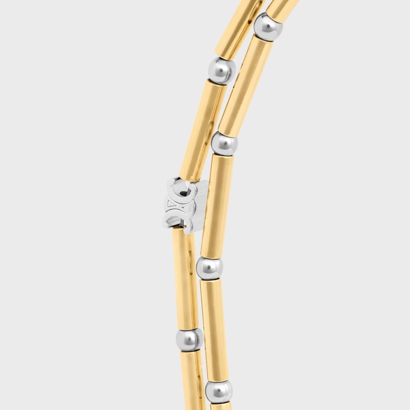 collier long celine charms en laiton avec finition or et rhodium