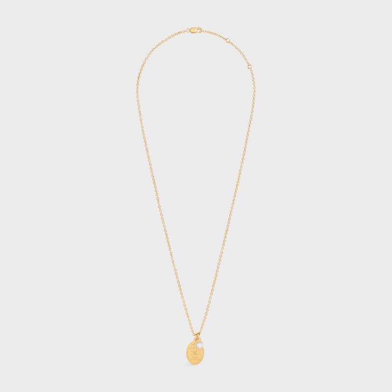 collier médaille les perles céline en résine perle et laiton finition dorée