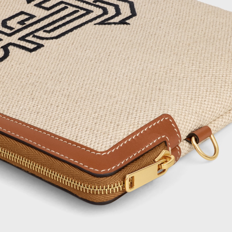 petite pochette À bandouliÈre en textile avec broderie dancre et peau de veau