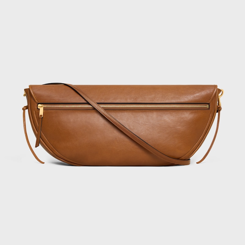 sac halfmoon soft triomphe en cuir dagneau souple et brillant