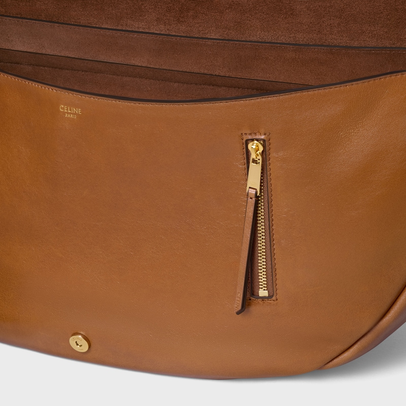 sac halfmoon soft triomphe en cuir dagneau souple et brillant