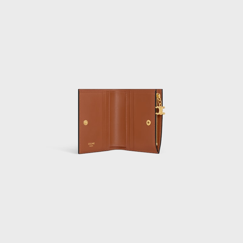 portefeuille compact triomphe charms en toile triomphe