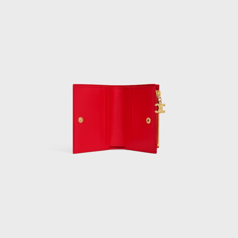 portefeuille compact triomphe charms en cuir de veau grainÉ